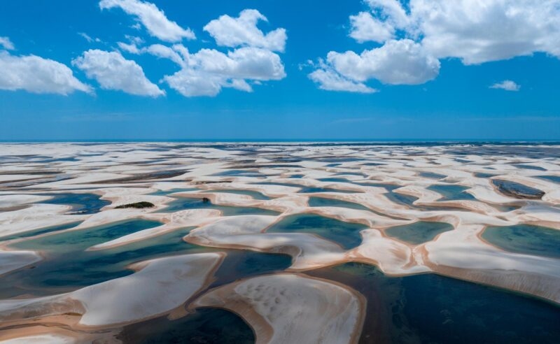 Aerial view of sand dunes and lagoons at Lençóis Maranhenses