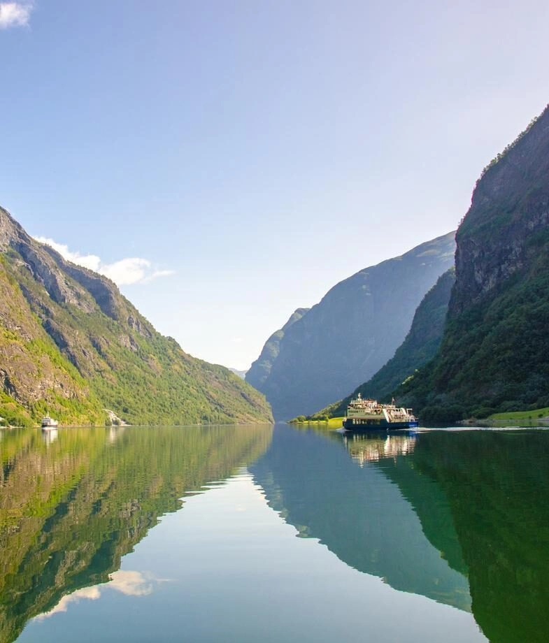 A stargazing experience beneath the vast night skies of Zimbabwe and a cruise adventure through the mirrored waters of Norway’s Nærøyfjord.