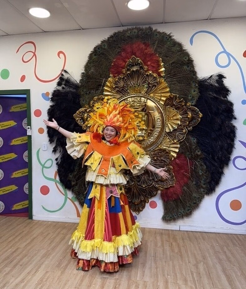 Our Jacada team trying on Carnival costumes in Brazil and a yacht cruising the Perito Moreno Glacier in Patagonia.