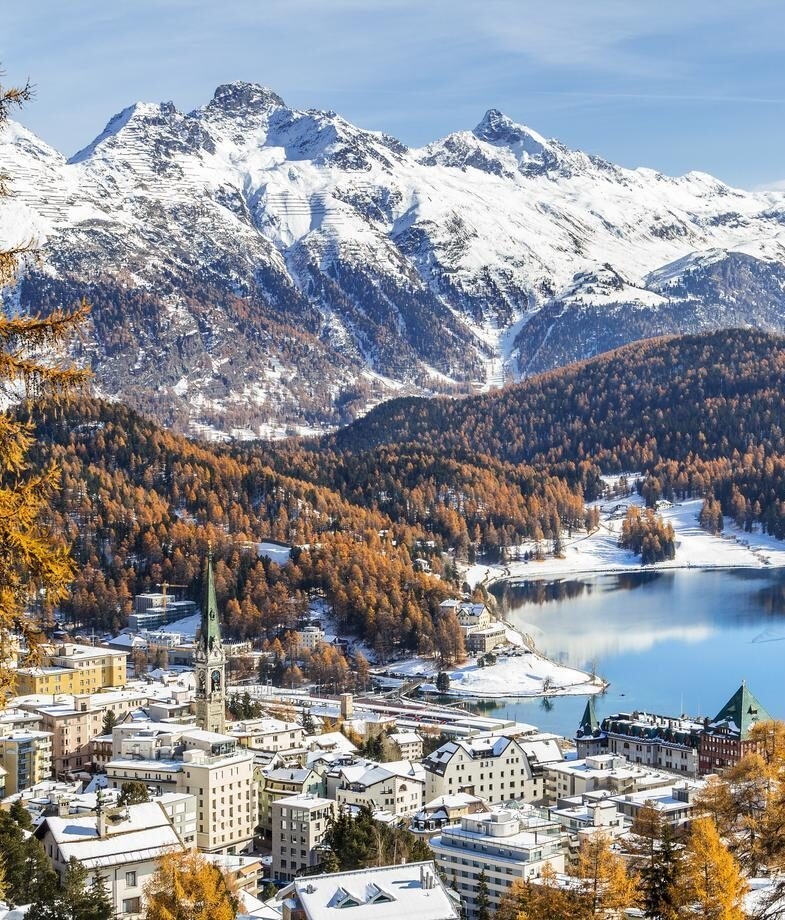 The snow-covered town of St. Moritz in Switzerland and the star-filled skies above the High Atlas Mountains in Morocco.
