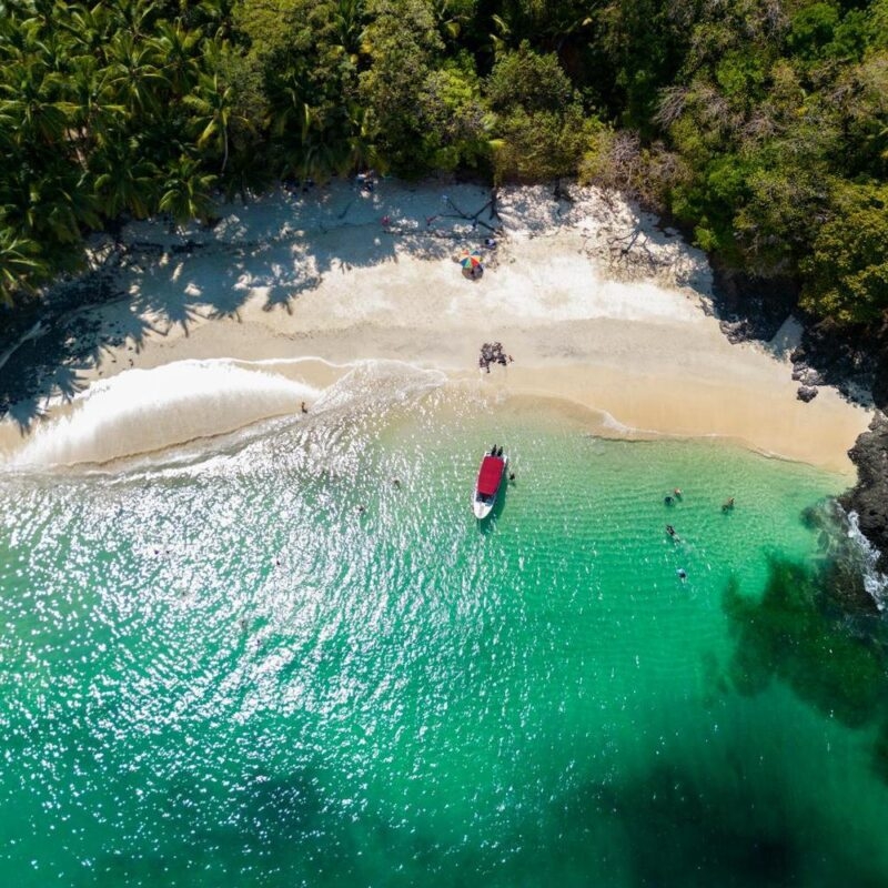 Aerial top view of Bolaños tropical island beach with white sand and emerald water, Chiriquí gulf, Chiriquí province, Panamá, Central America - stock photo