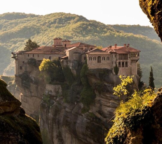 sunrise at the clifftop Great Meteoron monastery in Meteora, greece