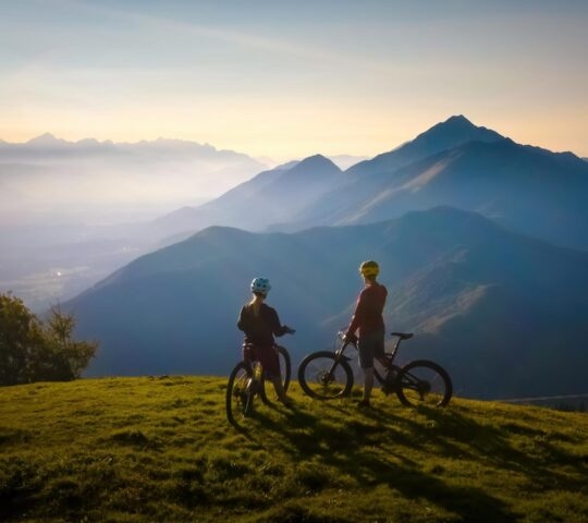 Two females on mountain bikes