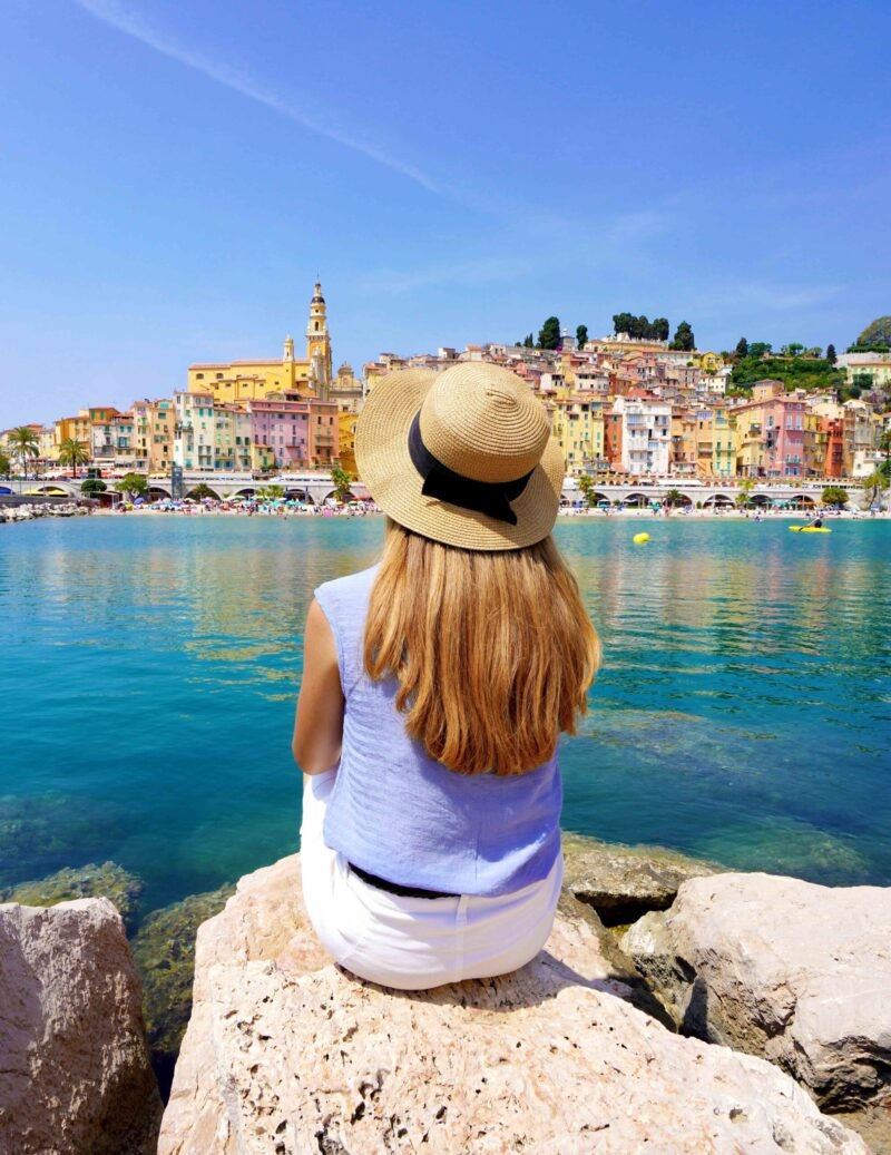 A woman enjoys the view on the French Riviera.