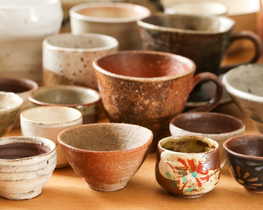 Japanese ceramic cups on a table.