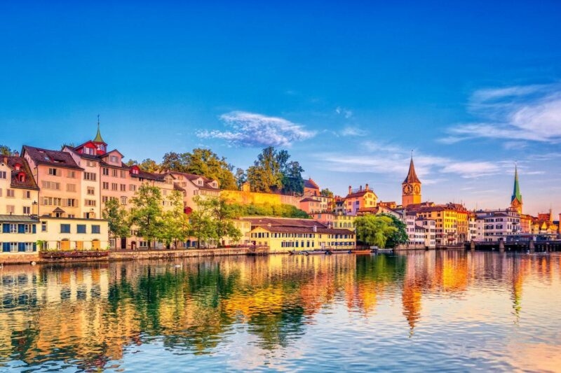 Sunrise in the historic downtown of Zurich at the Limmat River