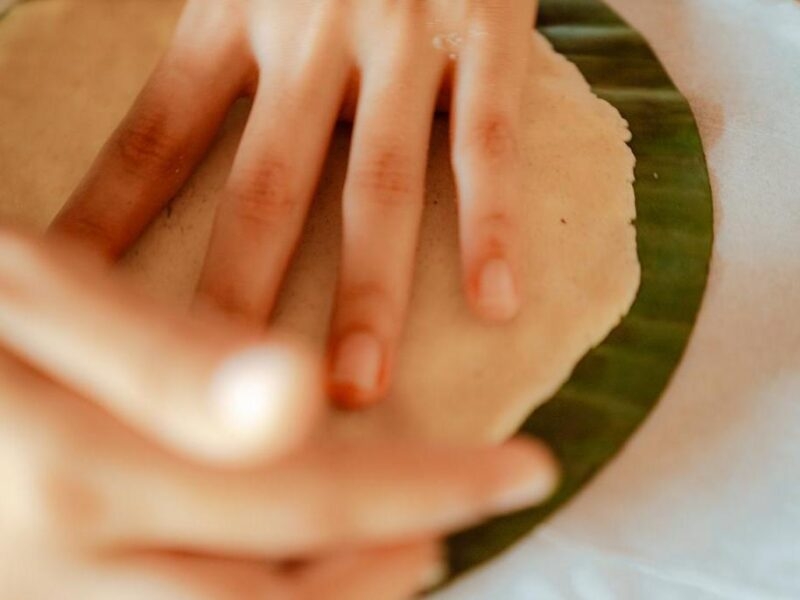 Hand makes traditional tortillas in Costa Rica.