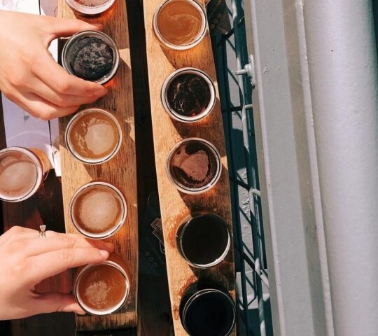 An overhead image of different beers at a brewery.