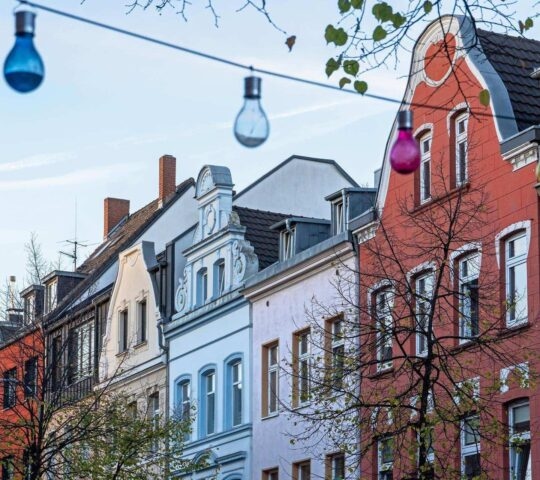 A glimpse of the traditional architecture along a street in Cologne.