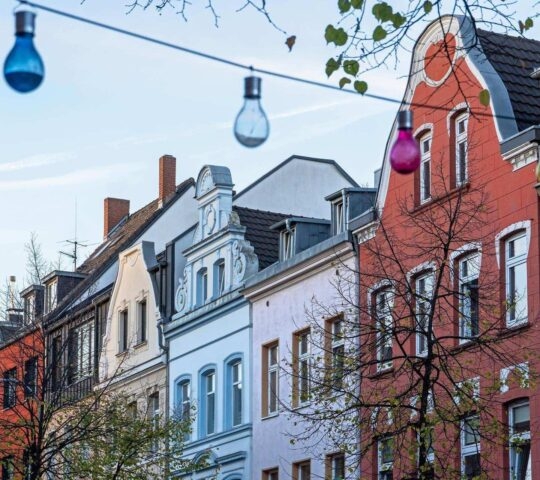 A glimpse of the traditional architecture along a street in Cologne.