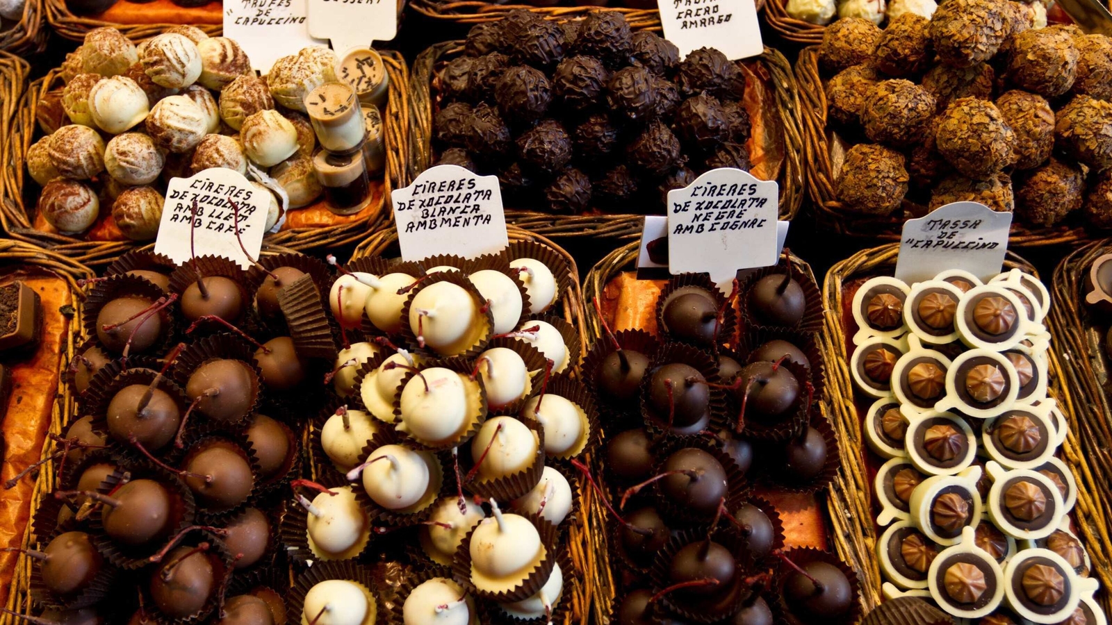 A close-up of chocolates in a row.