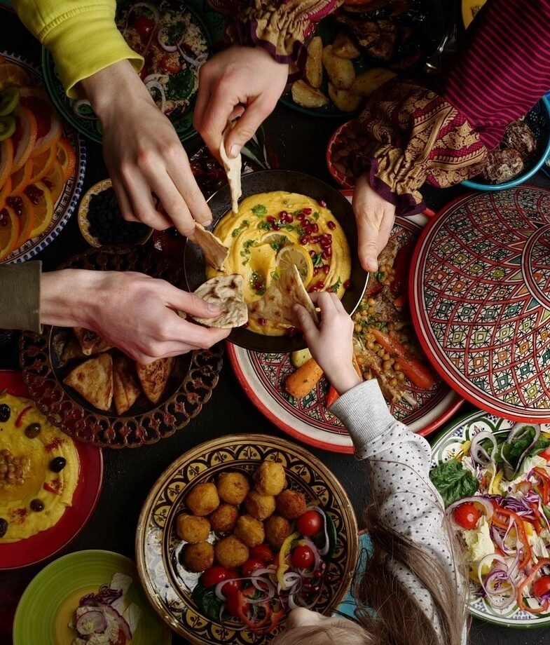 Enjoy a traditional Moroccan meal shared around the table, or drift along the Zambezi River on a sunset cruise as the light fades across the water.