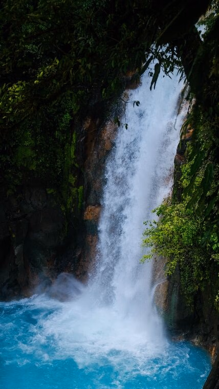 Turquoise Waterfall in a Nature Reserve Near Monteverde in the Tropical Mountains of Costa Rica