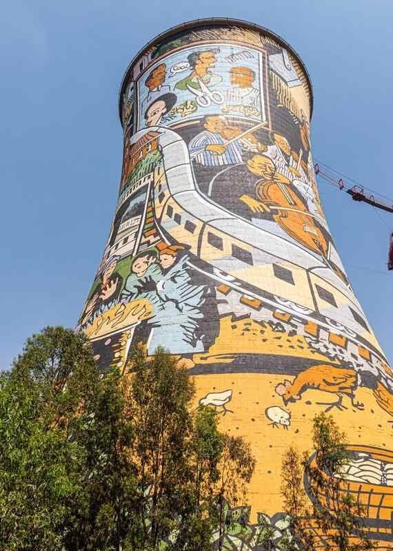 Cooling tower covered in colourful graffiti in Soweto township, Johannesburg