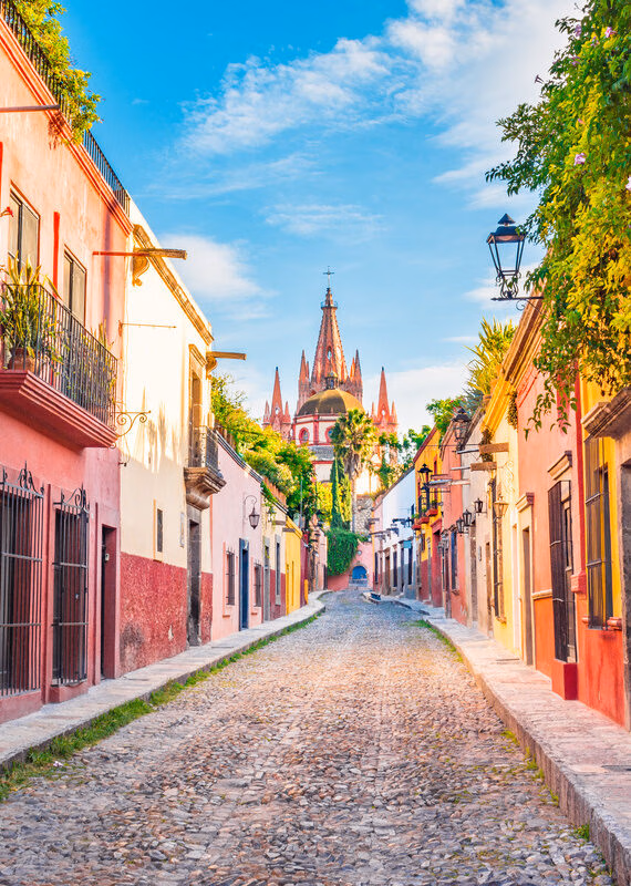 Street leading to the tall pink church in San Miguel de Allende, Mexico.