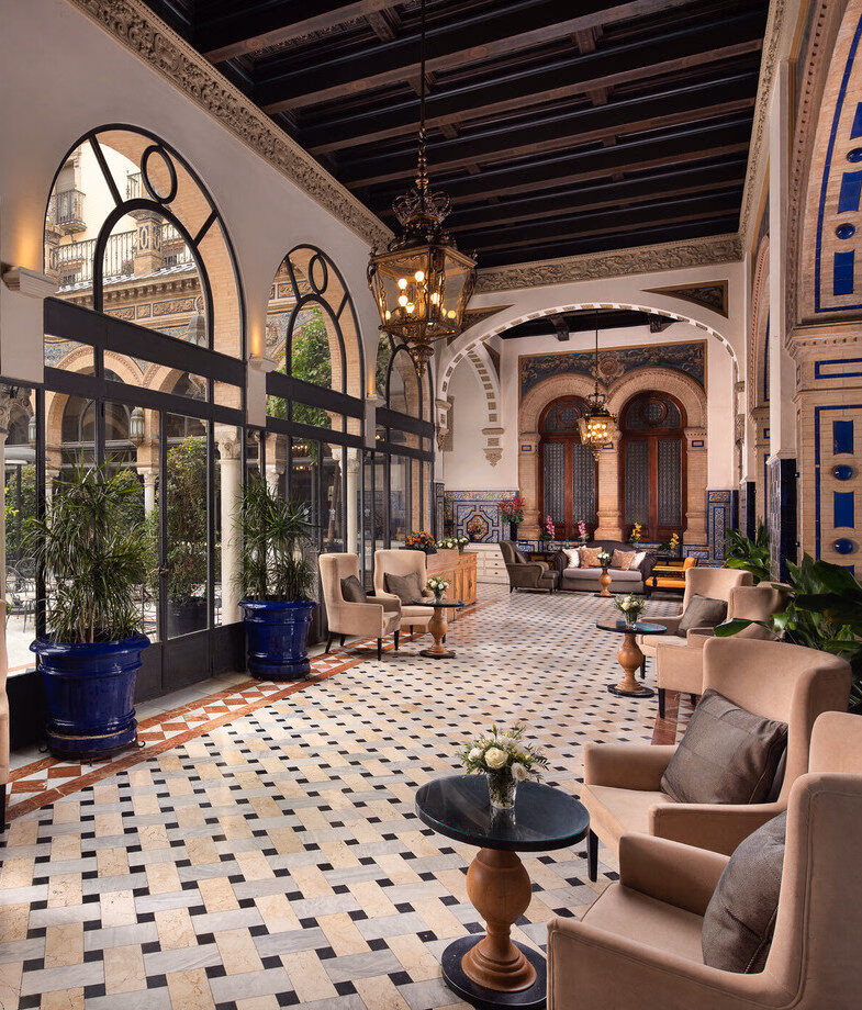 The outdoor kids’ club at Marbella Club Hotel and the elegant lounge area of Hotel Alfonso XIII showcasing its traditional Mudéjar architecture.
