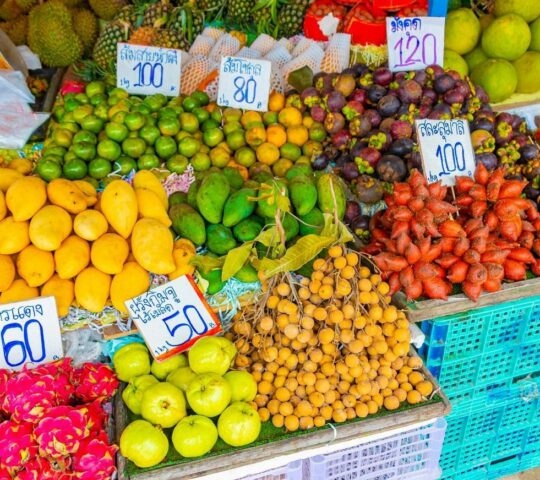 colourful fruit on display at a market in Koh Samui, Thailand