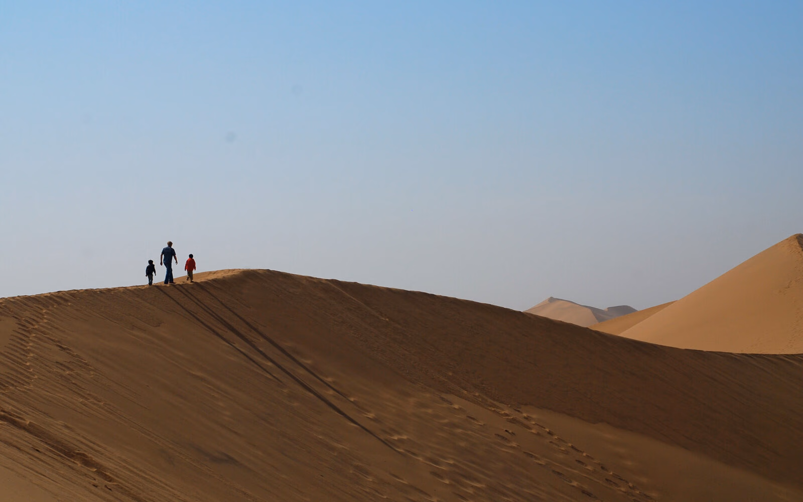 Explore the stunning dunes of Morocco's deserts with your family.