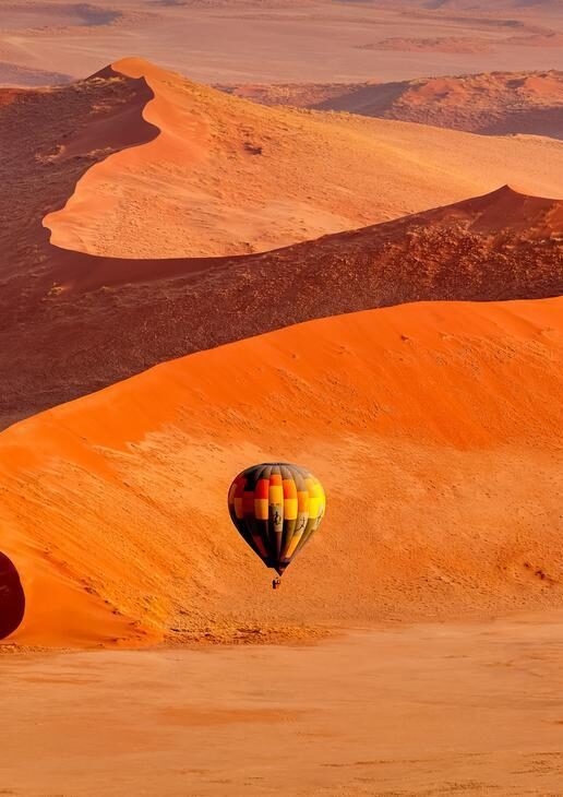 Explore Africa's deserts by floating in a hot air balloon, tracking rare wildlife or driving a quadbike