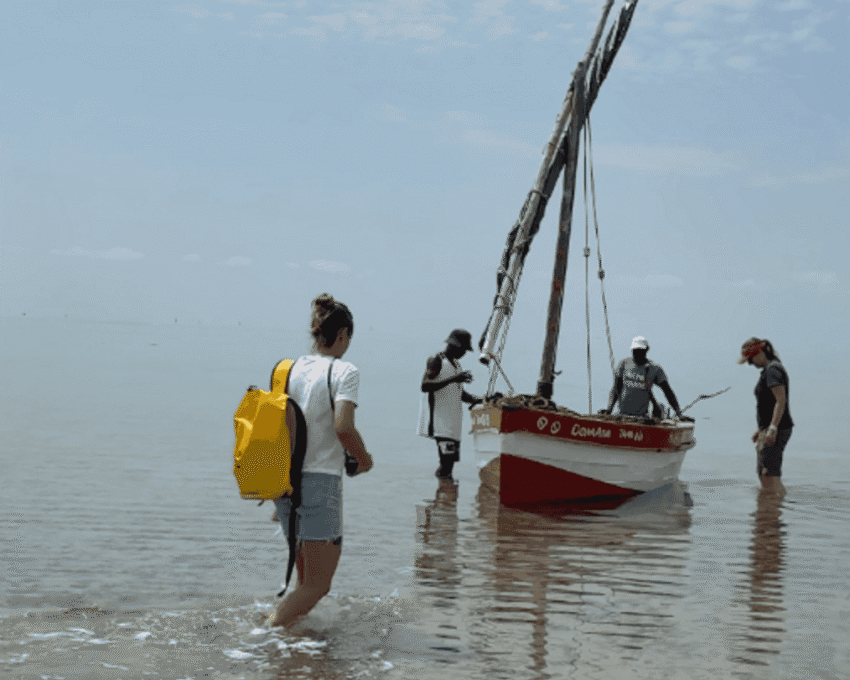 A wooden dhow boat in shallow waters in Mozambique's Bazaruto Archipelago