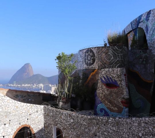 A white mosaic wall overlooking Sugar Loaf Mountain in Rio de Janeiro