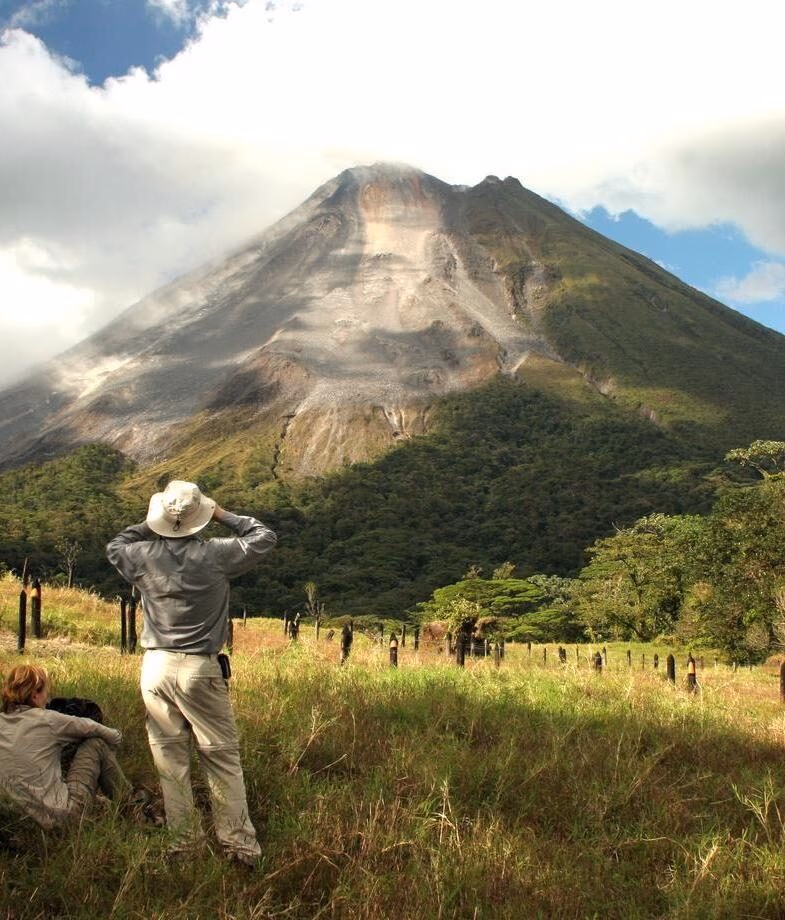 Head into the rainforests of Costa Rica to see three-toed sloths and the conical peak of the dormant Arenal volcano.