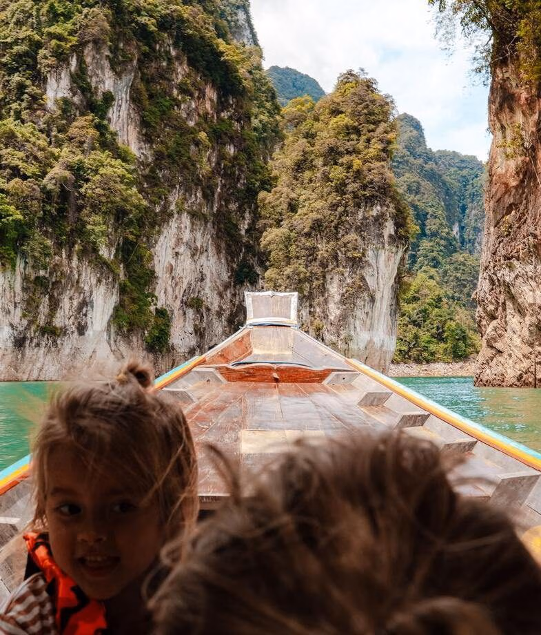 Glide through Khao Sok National Park on a traditional longtail boat and tour Thai temples with a private guide.