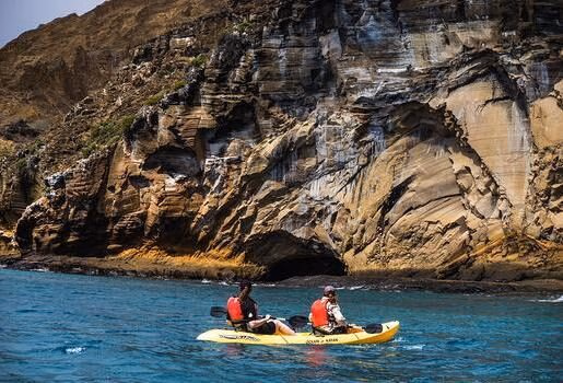 Spot great frigatebirds and blue-footed boobies on land, then kayak in search of Galápagos penguins on a birdwatching tour of these isolated islands.