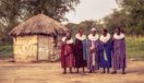 Maasai women and village