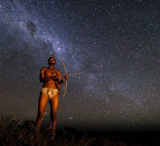 Kalahari Bushman watches the sky
