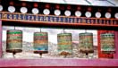 Prayer wheels with mantras in Himalaya mountains, Nepal