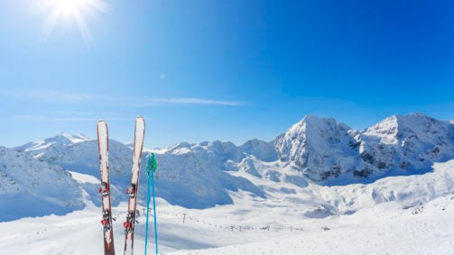 Mountains and ski equipments on slope, Alps