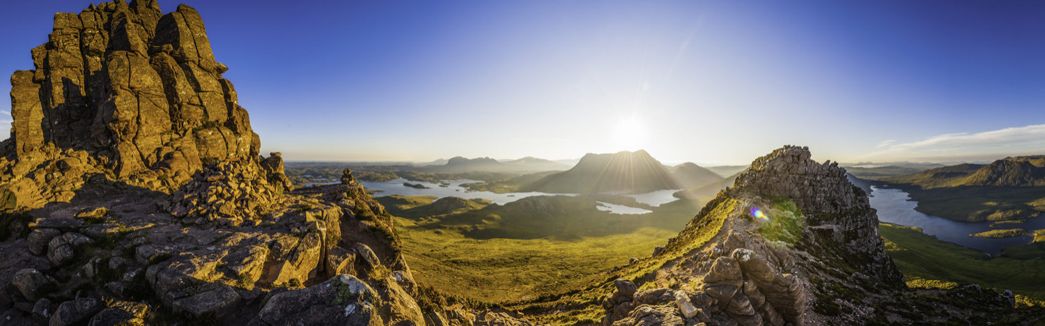 Scotland glorious dawn over Highland mountain peaks lochs glens panorama
