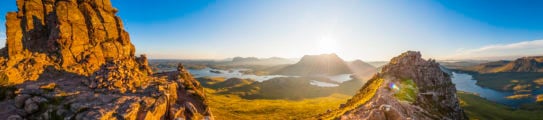 Scotland glorious dawn over Highland mountain peaks lochs glens panorama