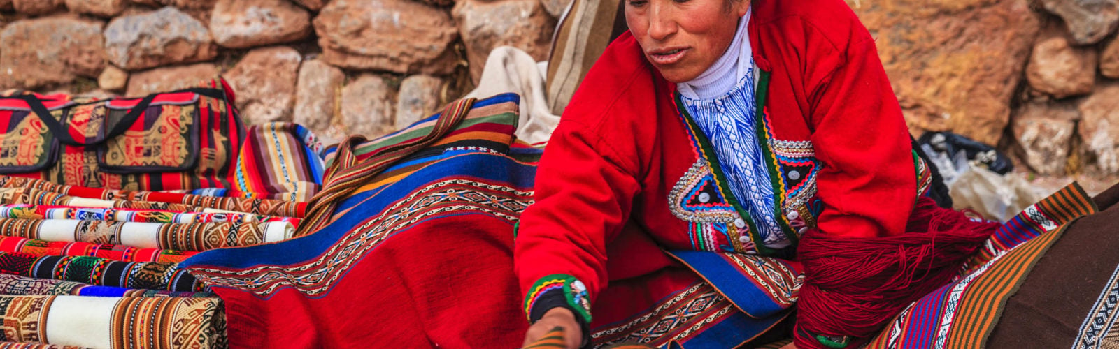 Peruvian woman, Inca ruins, Sacred Valley, Peru