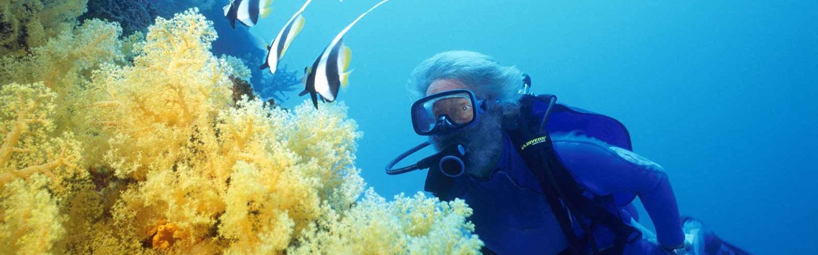 Senior lady scuba diving Fiji