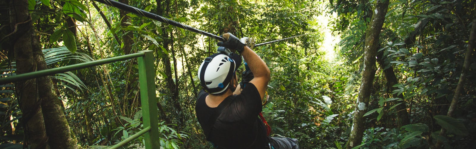 Zip-liner in the Costa Rica rainforest.