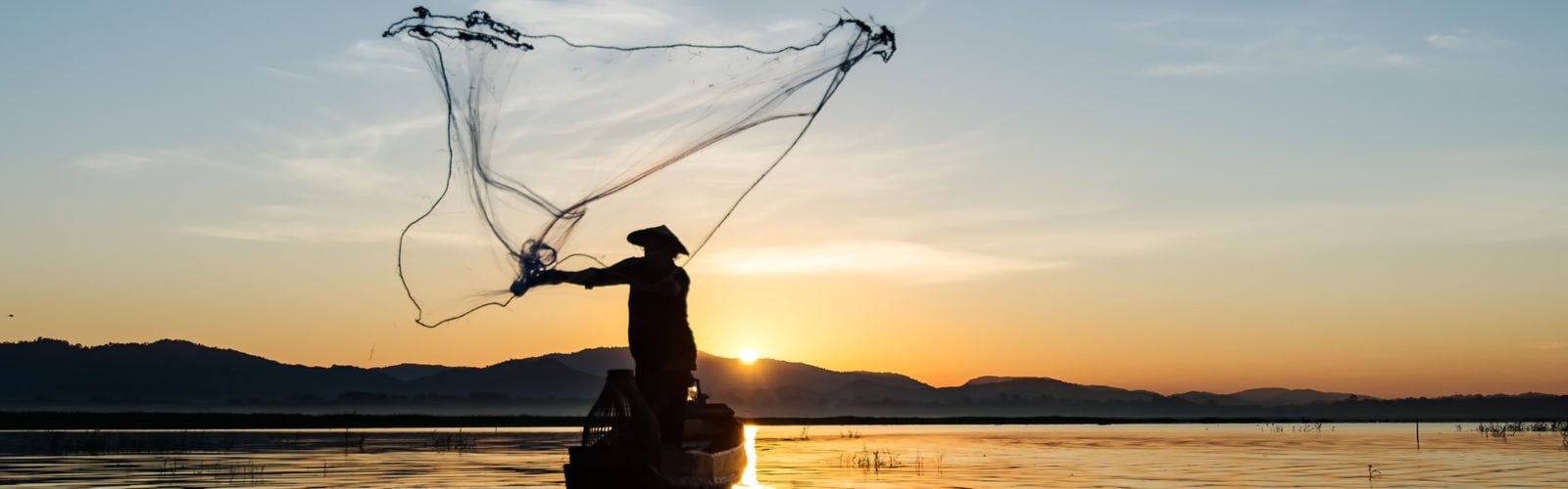 Fisherman casting net, Inle Lake, Myanmar