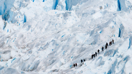 people-trekking-perito-moreno-glacier