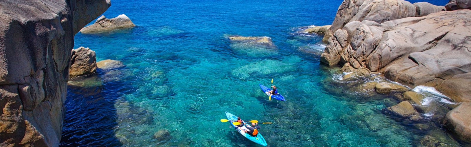 Kayaking on the crystal clear waters at Six Senses Zil Pasyon in the Seycelles.