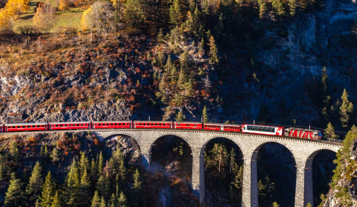The Gornergrad train running over the Landvasser Viaduct in the Swiss mountains