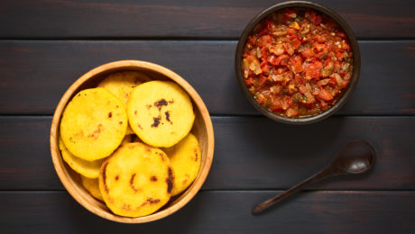 Arepas with hogao sauce, food of Colombia