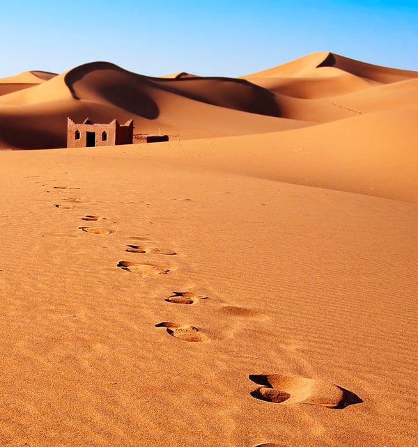 Sand dunes with footprints