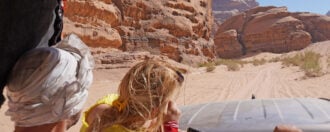 Jordan, The Wadi Rum Desert - tourist visiting the desert