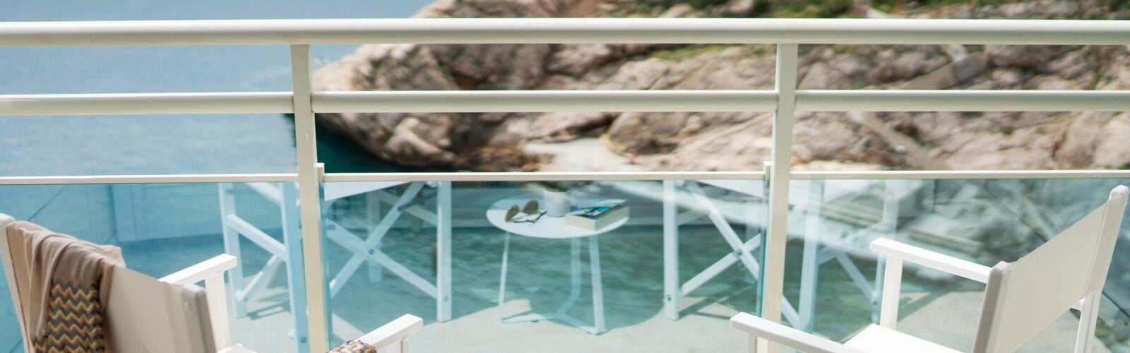 Balcony view with two chairs overlooking the ocean in Croatia Hotel Bellevue Dubrovnik