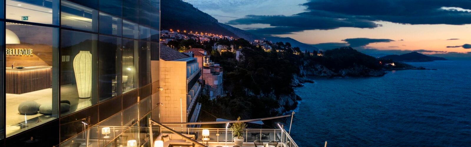 Balcony view at dusk overlooking the ocean in Croatia Hotel Bellevue Dubrovnik